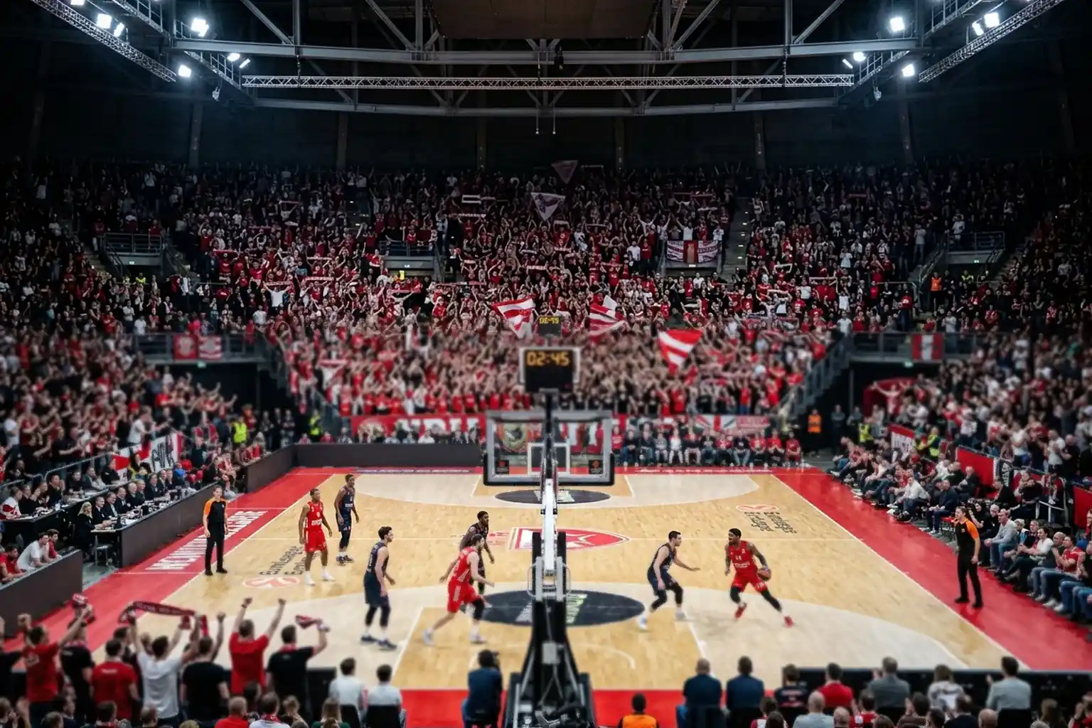 Afición de baloncesto en un pabellón europeo animando al equipo local durante un partido de Euroliga